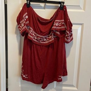 Brand new rust colored shorts romper with elastic cap sleeves.  Size large